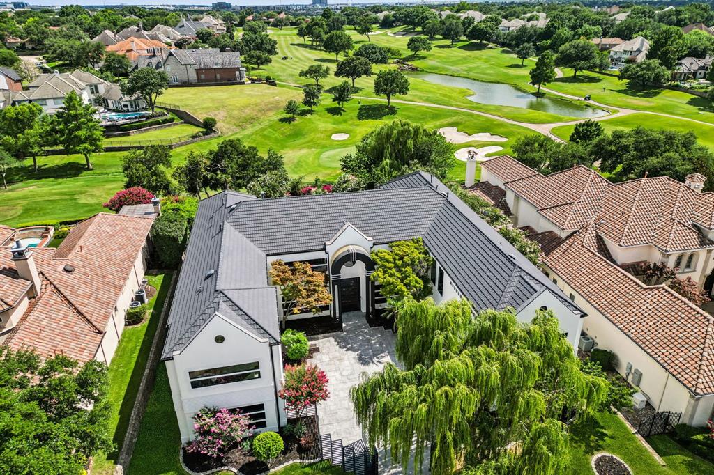 6 Savannah Ridge Frisco, TX 75034 - Photo 1 of 40 an aerial view of a house with a garden