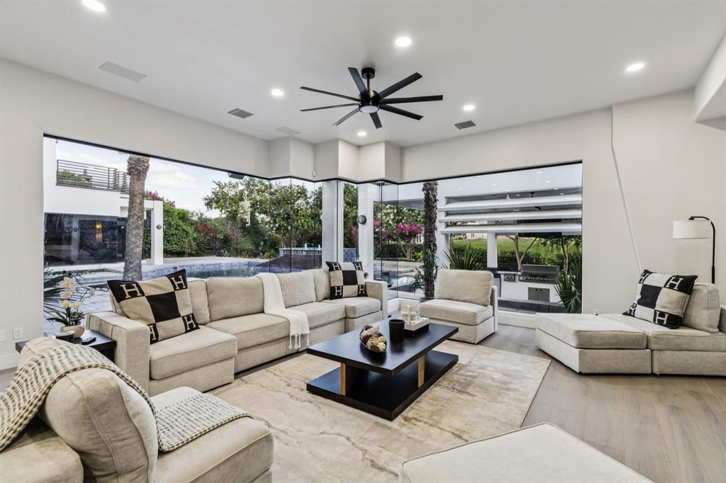 6 Savannah Ridge Frisco, TX 75034 - Photo 17 of 40 a living room with furniture and a large window