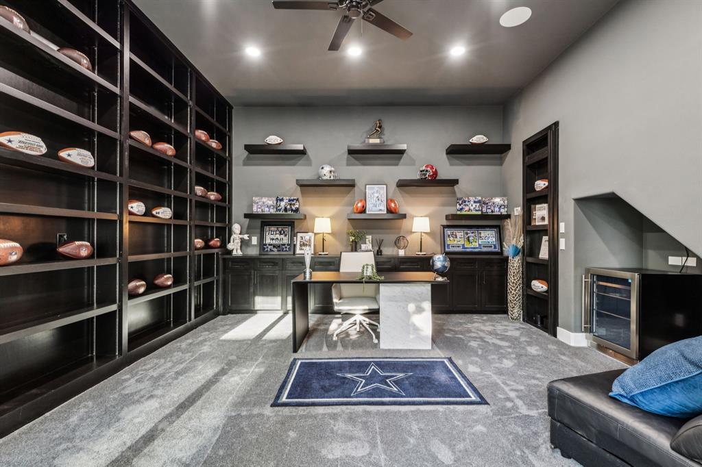 6 Savannah Ridge Frisco, TX 75034 - Photo 21 of 40 a kitchen with stainless steel appliances kitchen island granite countertop a refrigerator a stove and a sink with wooden floor