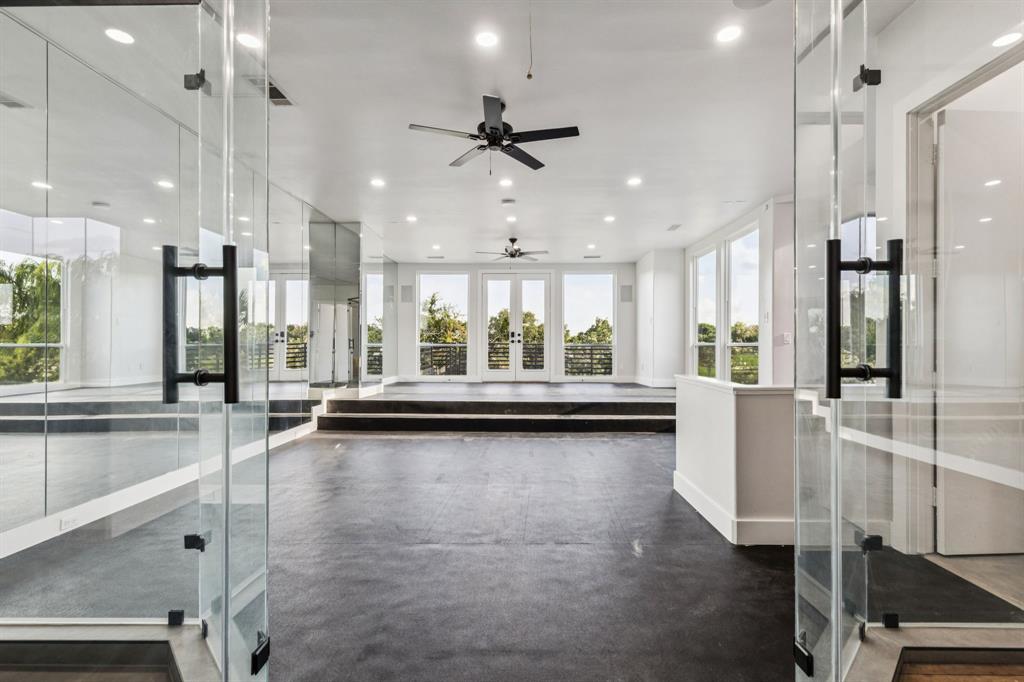6 Savannah Ridge Frisco, TX 75034 - Photo 25 of 40 a view of a kitchen with large windows and refrigerator