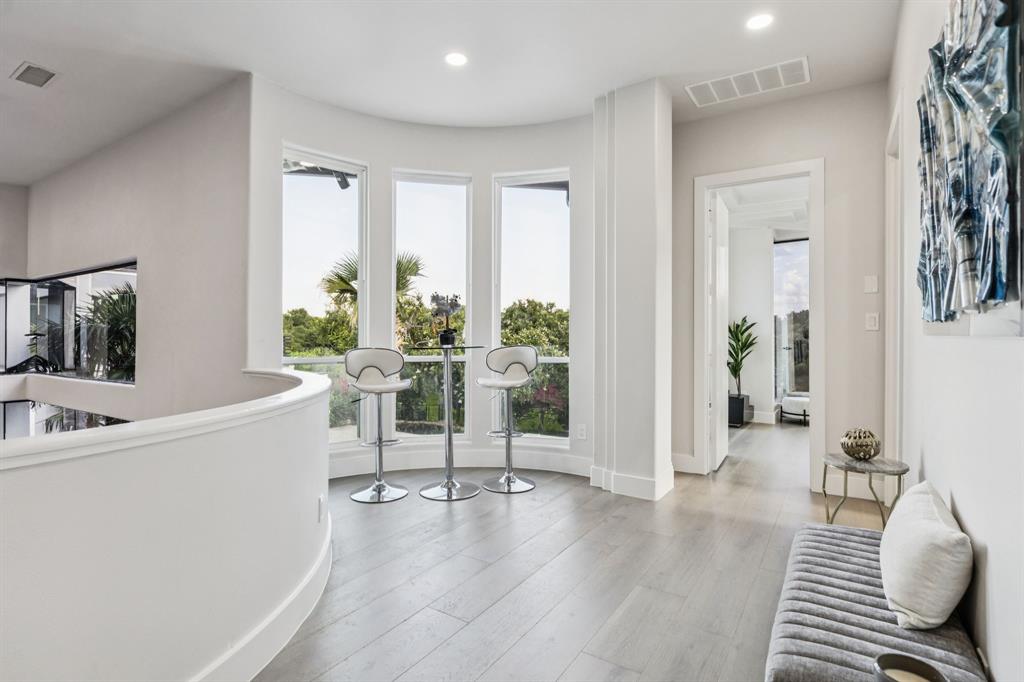 6 Savannah Ridge Frisco, TX 75034 - Photo 29 of 40 a living room with furniture and a table