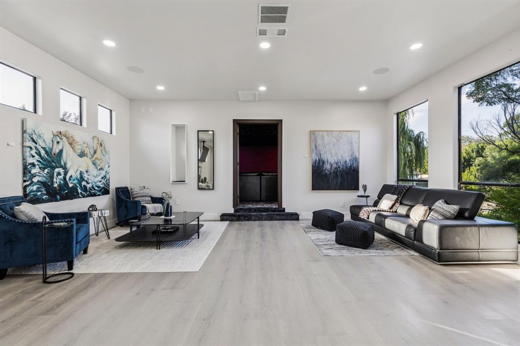 6 Savannah Ridge Frisco, TX 75034 - Photo 34 of 40 a living room with furniture and a large window