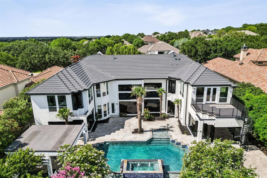 6 Savannah Ridge Frisco, TX 75034 - Photo 39 of 40 an aerial view of a house with garden space and a patio