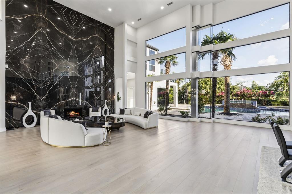 6 Savannah Ridge Frisco, TX 75034 - Photo 4 of 40 a view of a livingroom with furniture and floor to ceiling window