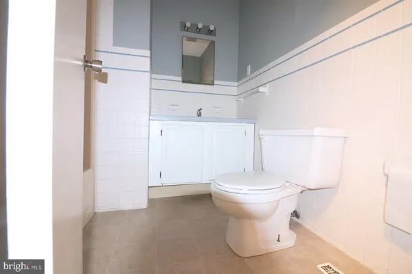 a bathroom with a sink and a toilet