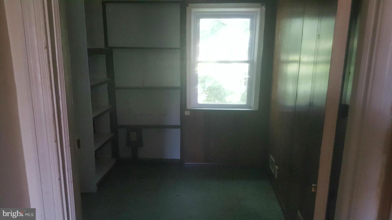 6224 Falkirk Road Baltimore, MD 21239 - Photo 8 of 11 a close view of walk in closet