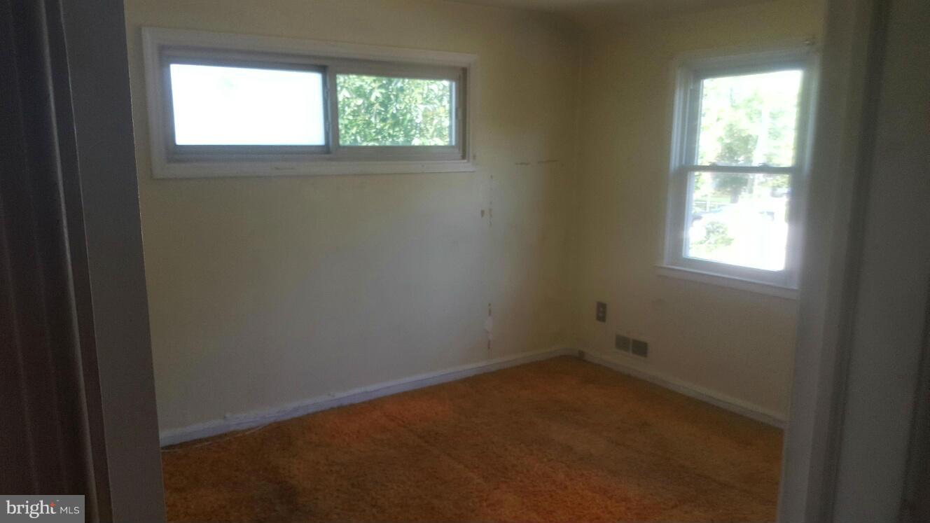 6224 Falkirk Road Baltimore, MD 21239 - Photo 10 of 11 an empty room with a window