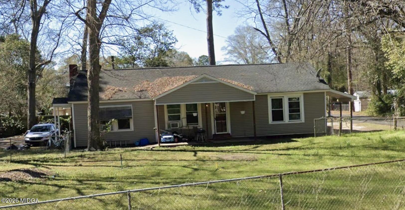 1107 4th Street Perry, GA 31069 - Photo 1 of 1 a view of a house with a backyard