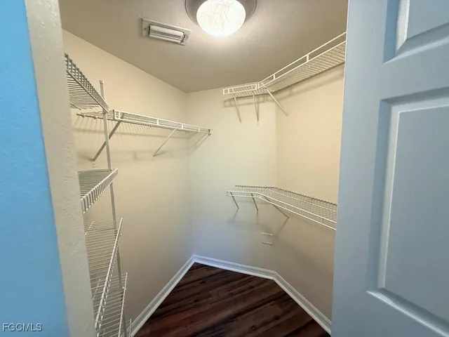 a view of a room with racks on the wall