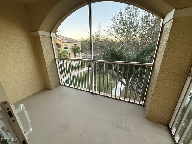a view of a cars in front of a building