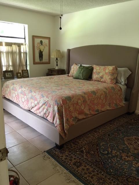 423 Buttonwood Place, Unit B24 Boca Raton, FL 33431 - Photo 8 of 12 MASTER BEDROOM