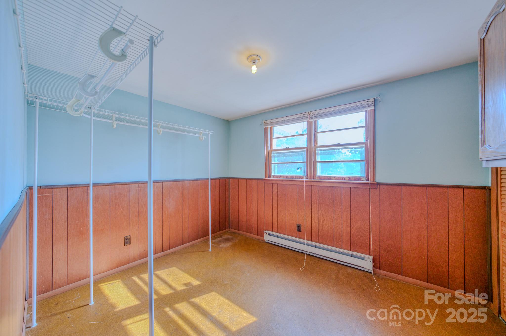 531 Bryson Road Candler, NC 28715 - Photo 19 of 45 a view of an empty room and window