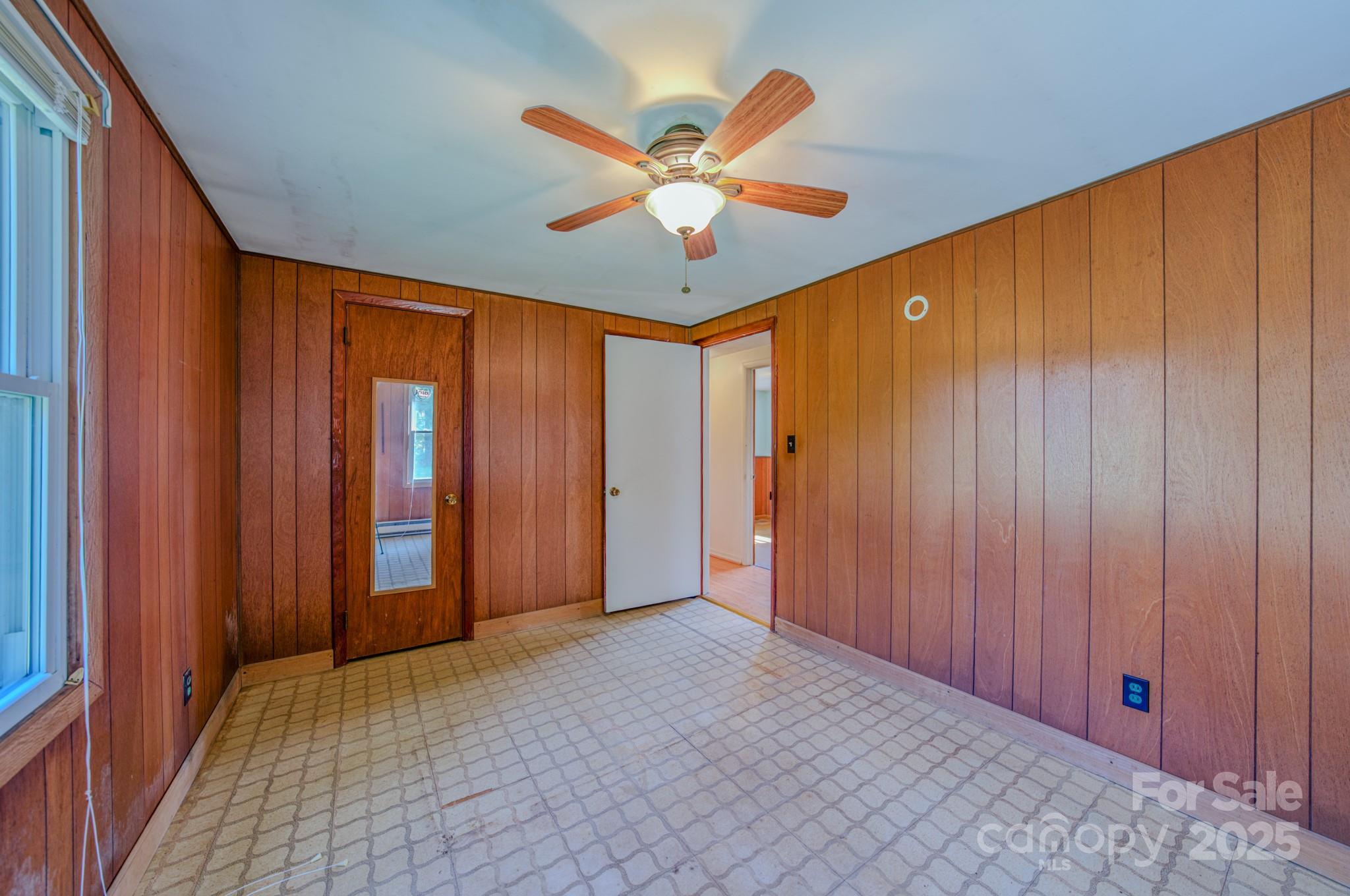531 Bryson Road Candler, NC 28715 - Photo 24 of 45 a view of an empty room with a window