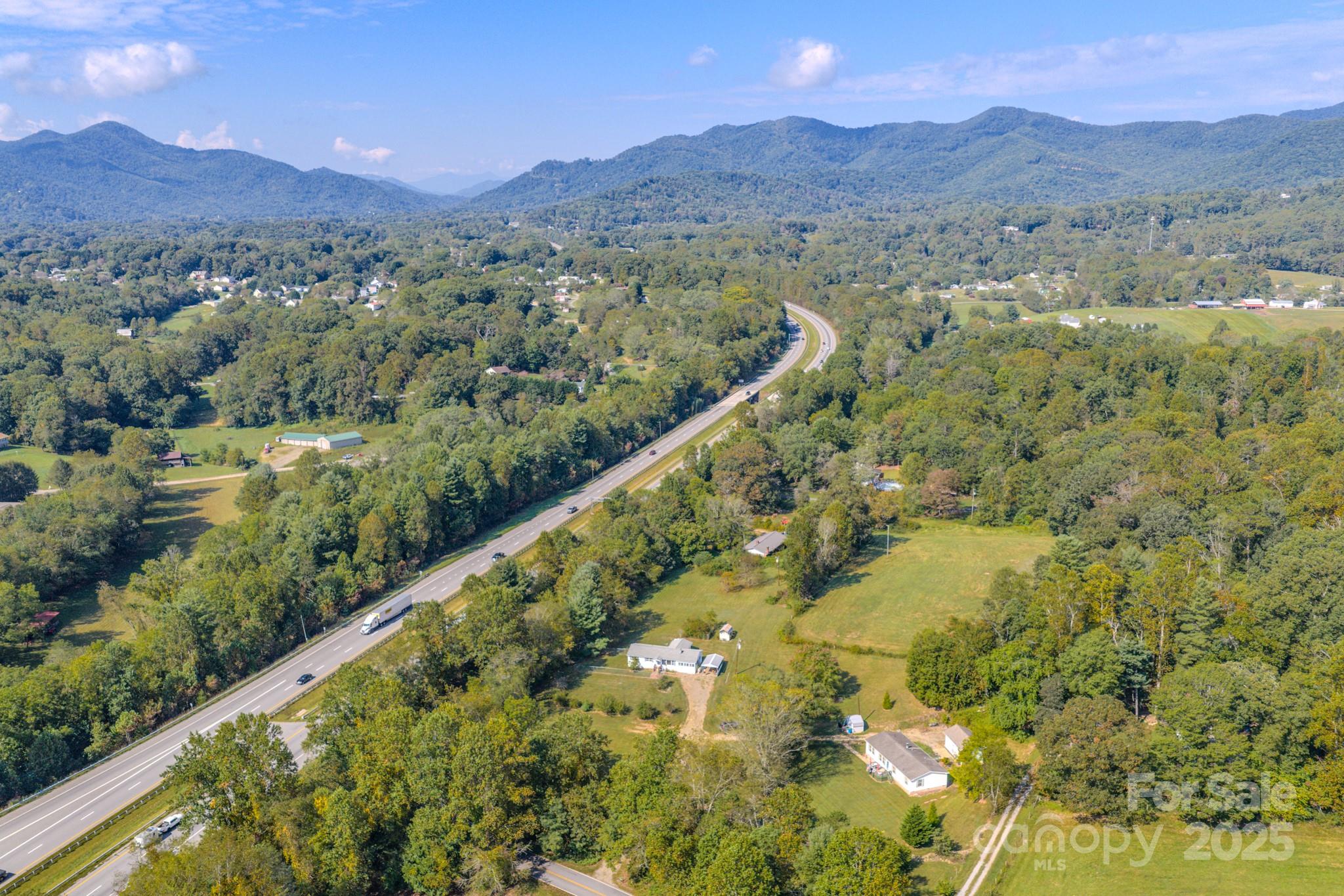 531 Bryson Road Candler, NC 28715 - Photo 44 of 45 a view of a city with mountains in the background