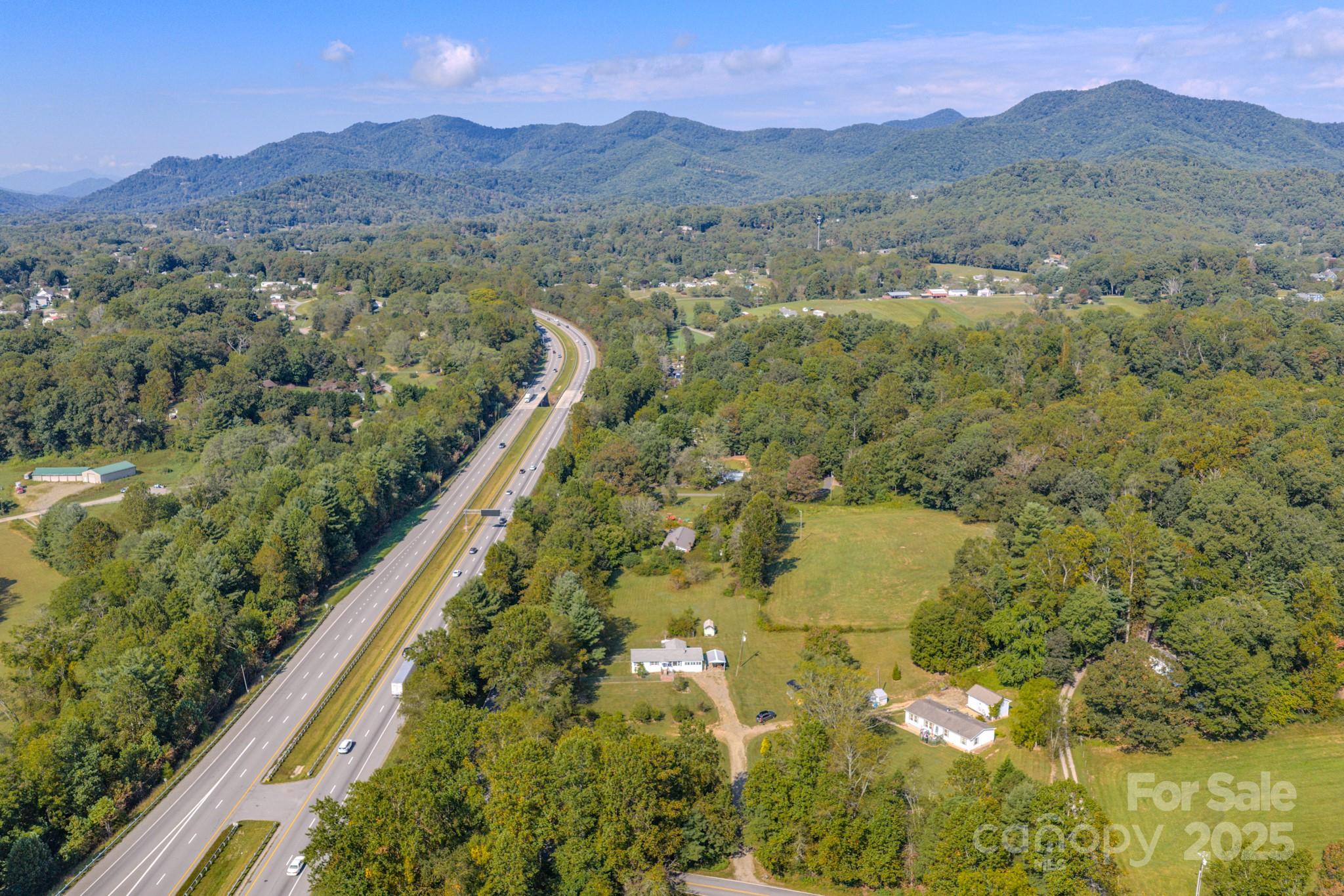 531 Bryson Road Candler, NC 28715 - Photo 45 of 45 a view of a city with mountains in the background