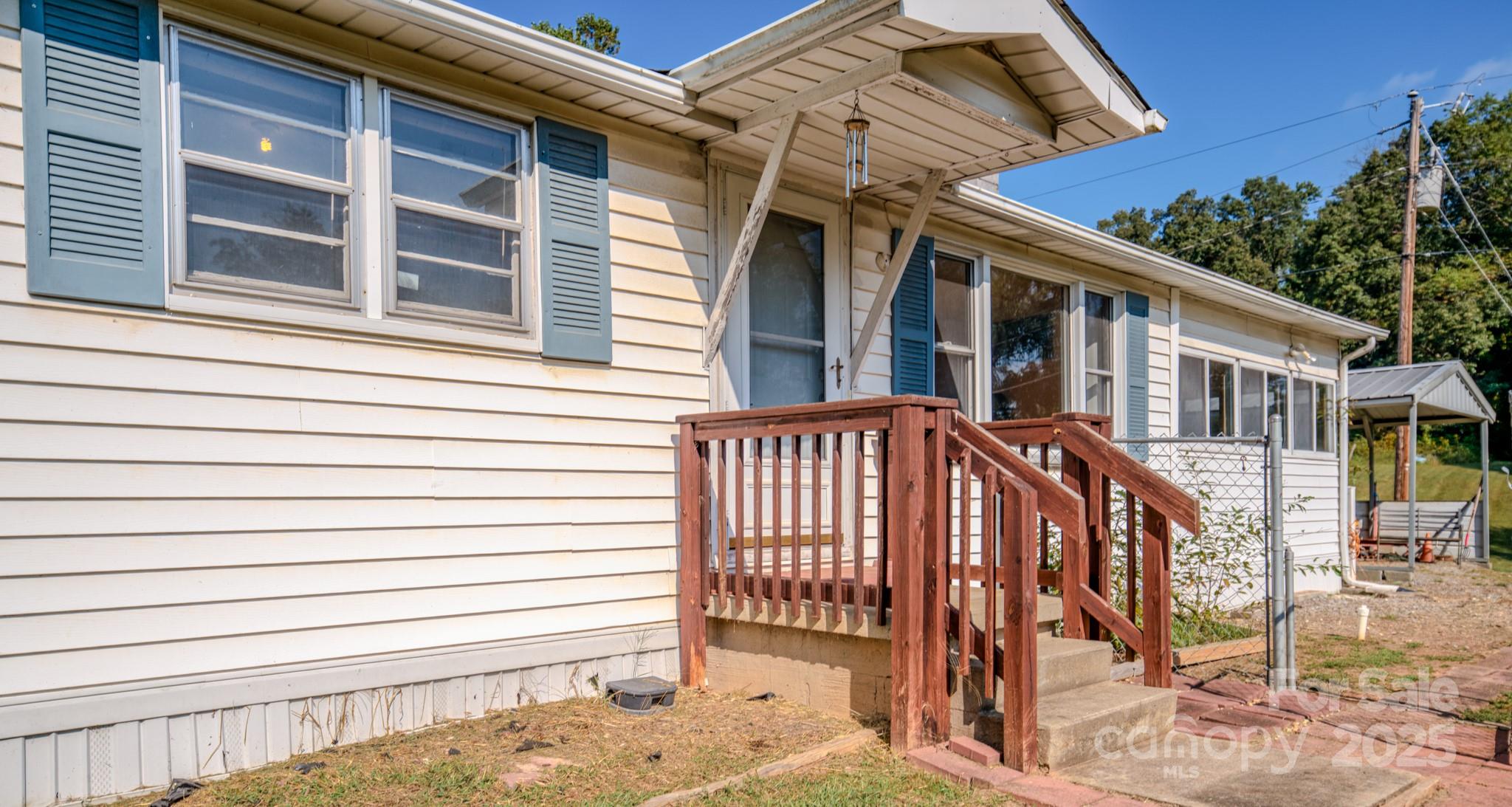 531 Bryson Road Candler, NC 28715 - Photo 8 of 45 a view of a house with a window