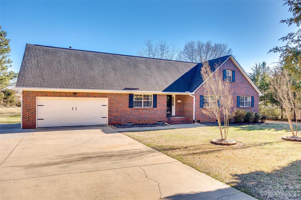 339 Gold Hill Road Fort Mill, SC 29715 - Photo 1 of 48 a front view of a house with a yard