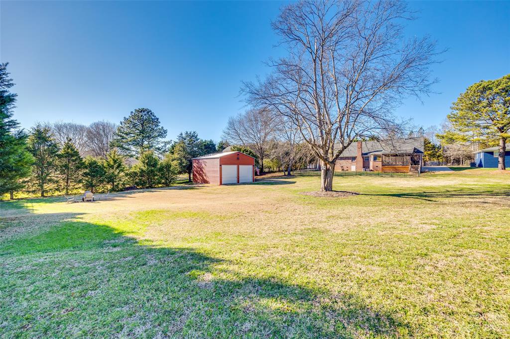 339 Gold Hill Road Fort Mill, SC 29715 - Photo 41 of 48 a house with swimming pool in front of it