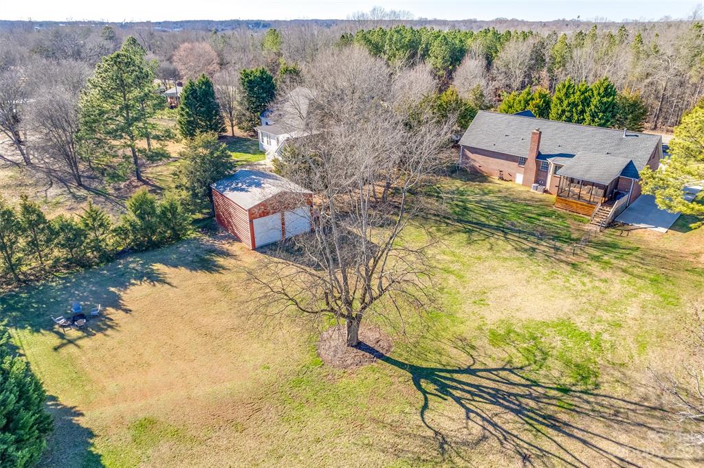 339 Gold Hill Road Fort Mill, SC 29715 - Photo 48 of 48 an aerial view of residential house with pool and yard