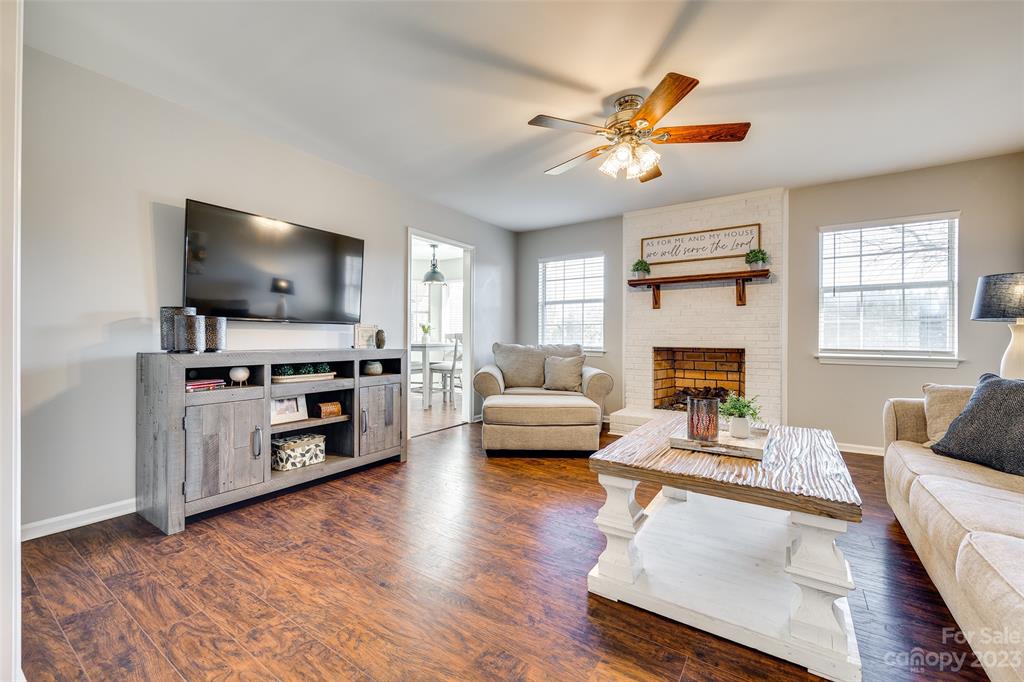 339 Gold Hill Road Fort Mill, SC 29715 - Photo 5 of 48 a living room with furniture and a flat screen tv