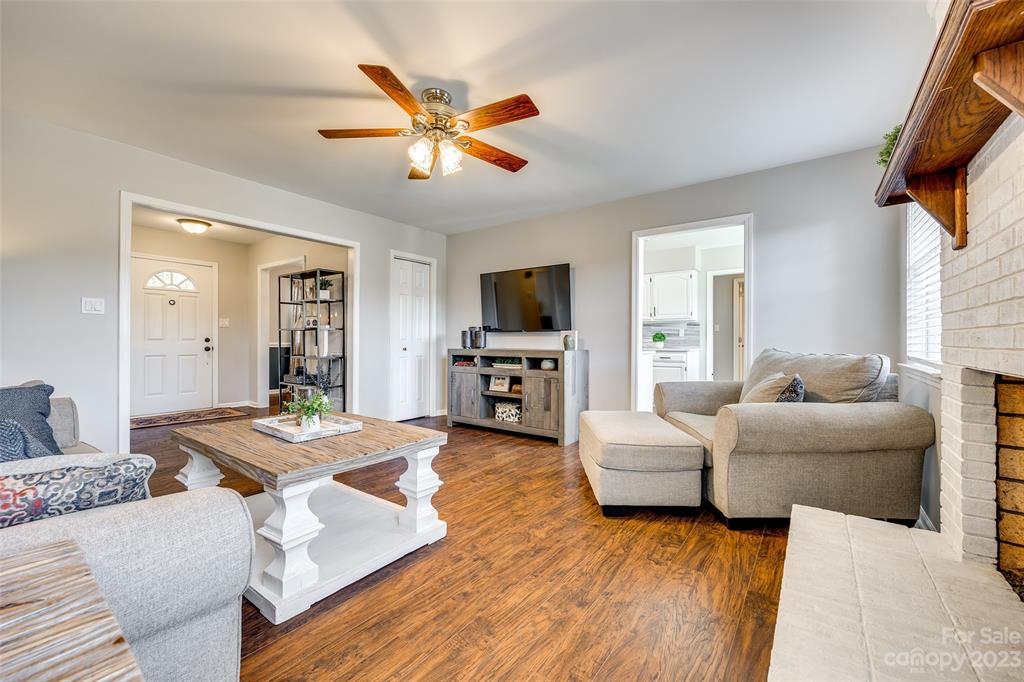 339 Gold Hill Road Fort Mill, SC 29715 - Photo 7 of 48 a living room with furniture and a flat screen tv