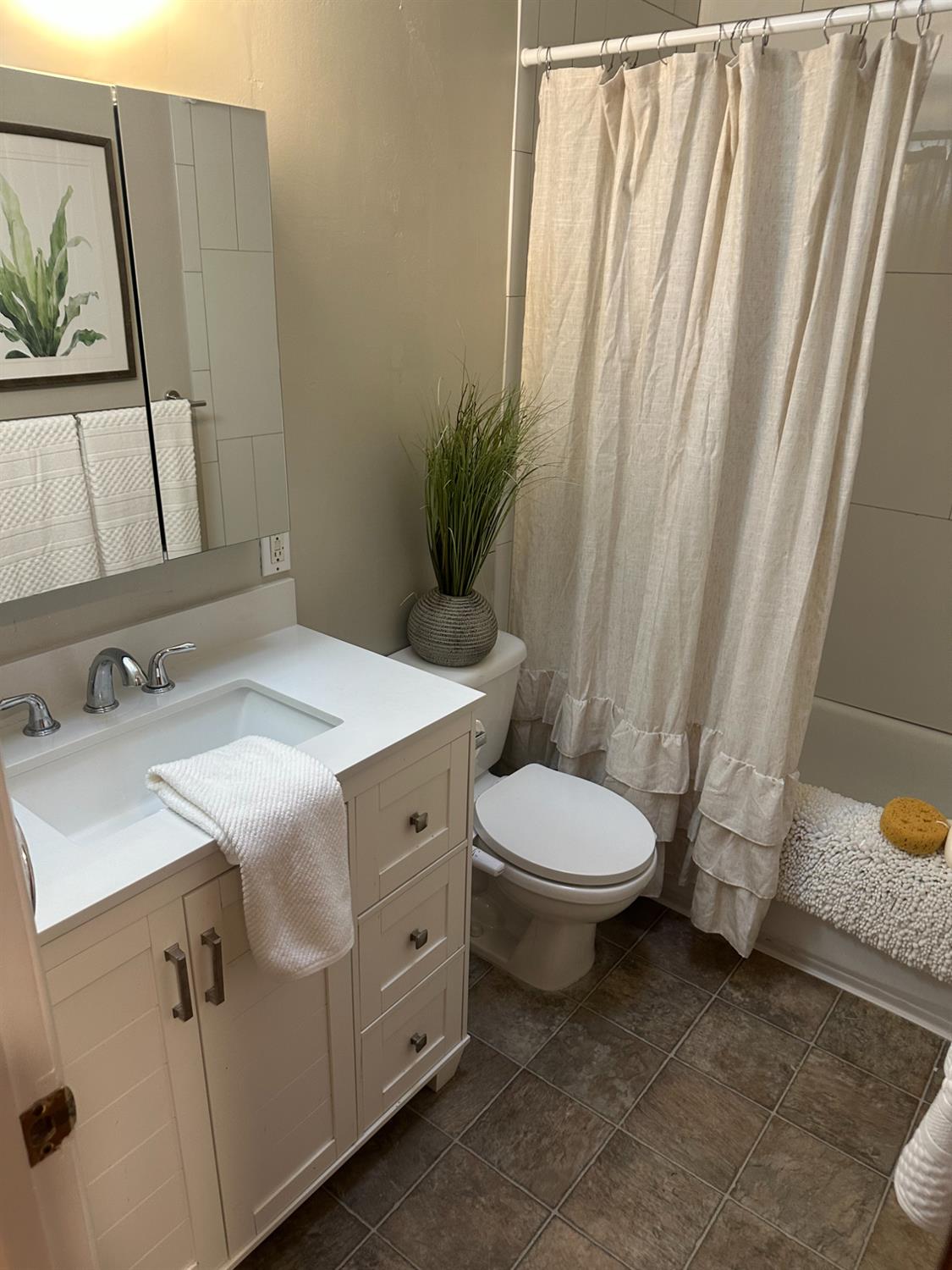 2013 Jerry Lane Lodi, CA 95242 - Photo 26 of 52 a bathroom with a sink a toilet and a mirror