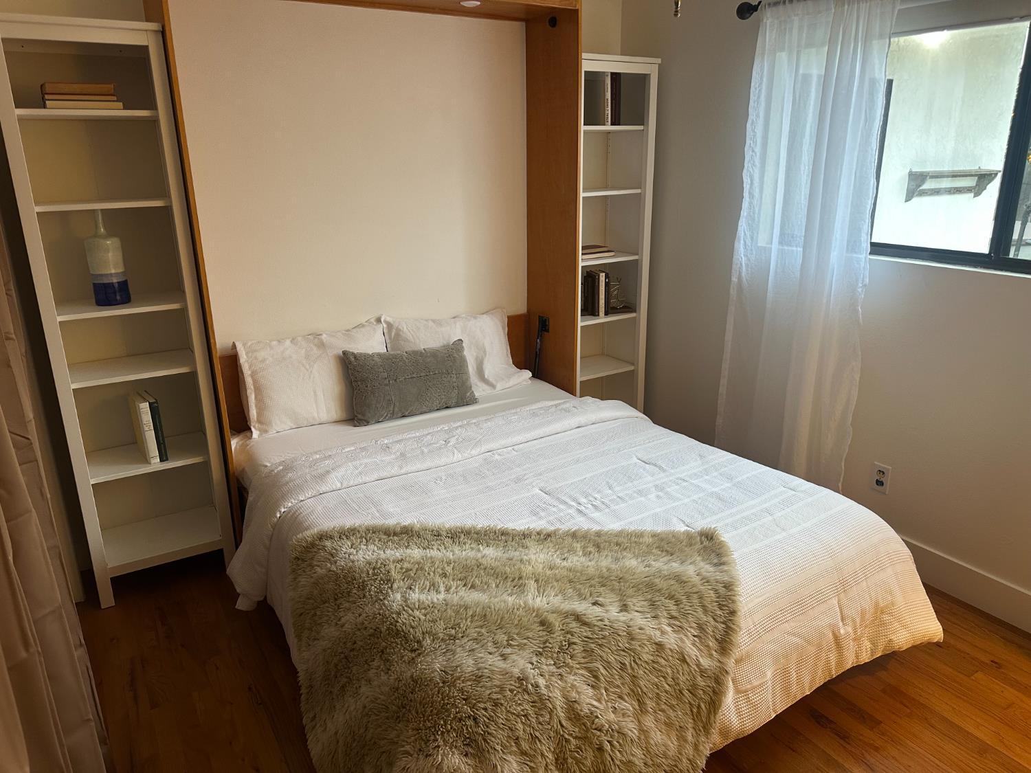 2013 Jerry Lane Lodi, CA 95242 - Photo 27 of 52 a bedroom with a bed and a window