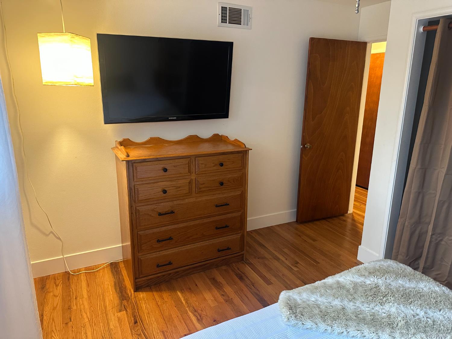 2013 Jerry Lane Lodi, CA 95242 - Photo 28 of 52 a view of a living room with furniture and a flat screen tv