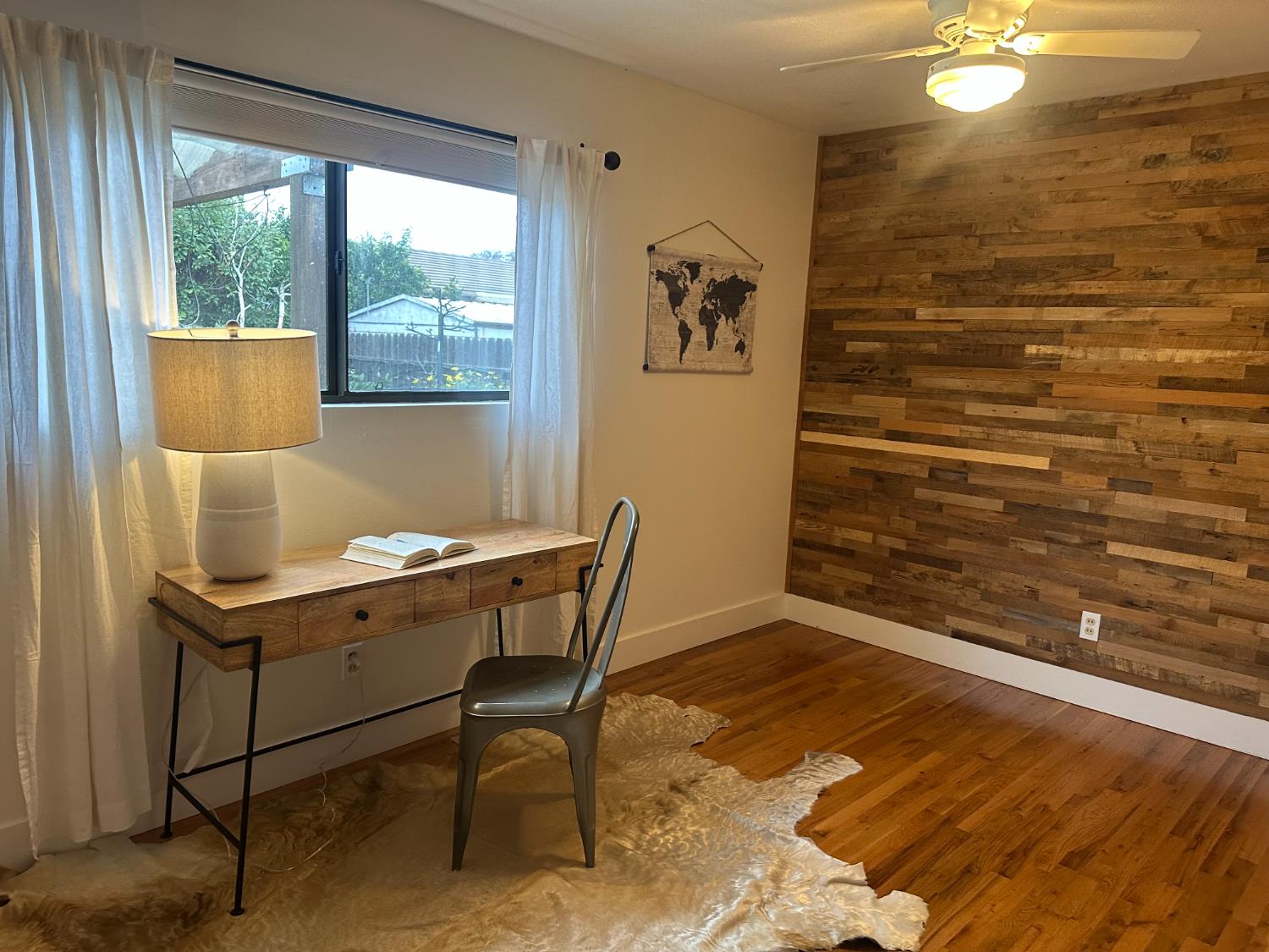 2013 Jerry Lane Lodi, CA 95242 - Photo 29 of 52 a view of a workspace with furniture and a window