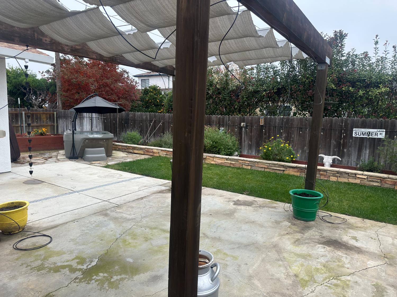 2013 Jerry Lane Lodi, CA 95242 - Photo 44 of 52 a view of a patio with a table chairs and a small yard