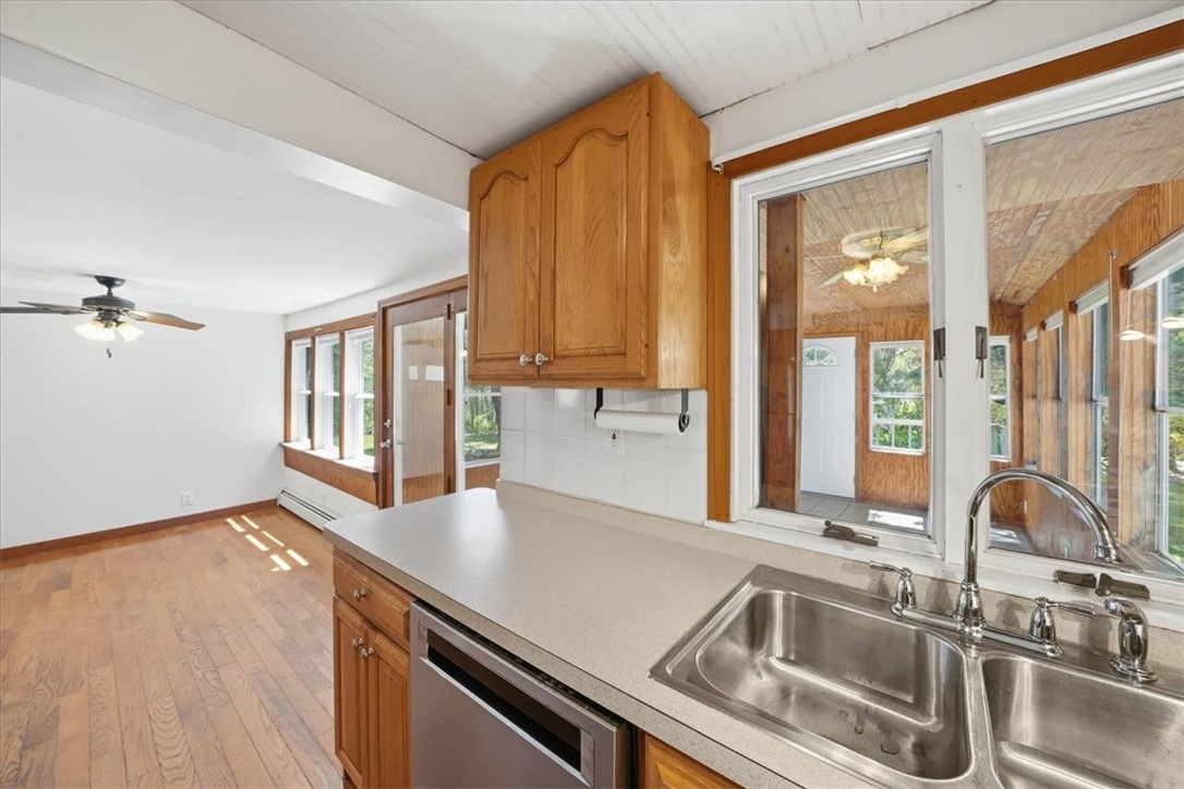 322 Rocky Hill Road Scituate, RI 02857 - Photo 22 of 50 The kitchen opens directly into the dining area, making it perfect for gatherings and everyday meals.