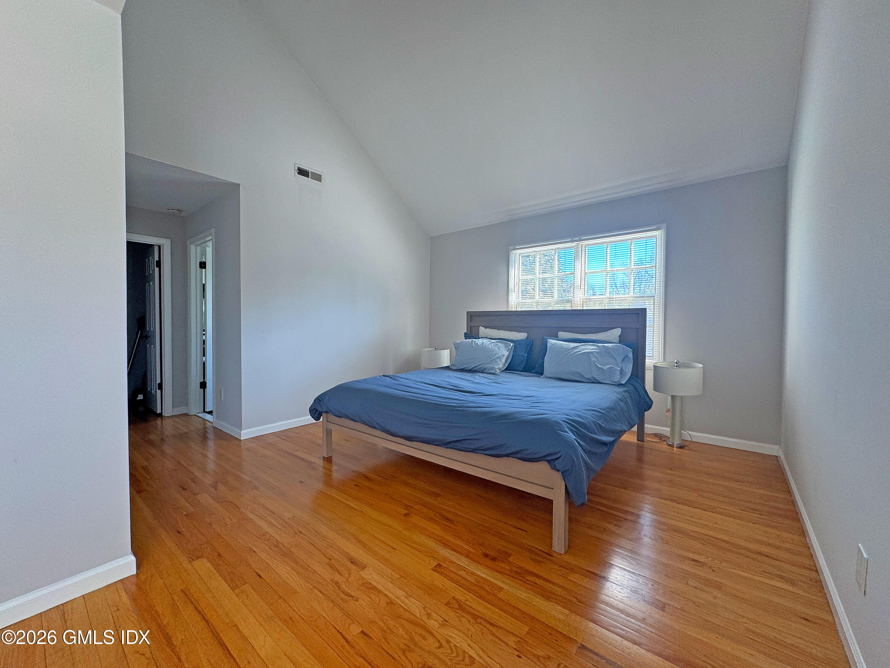 28 Home Place, Unit A2 Greenwich, CT 06830 - Photo 14 of 28 a bedroom with a bed and a window