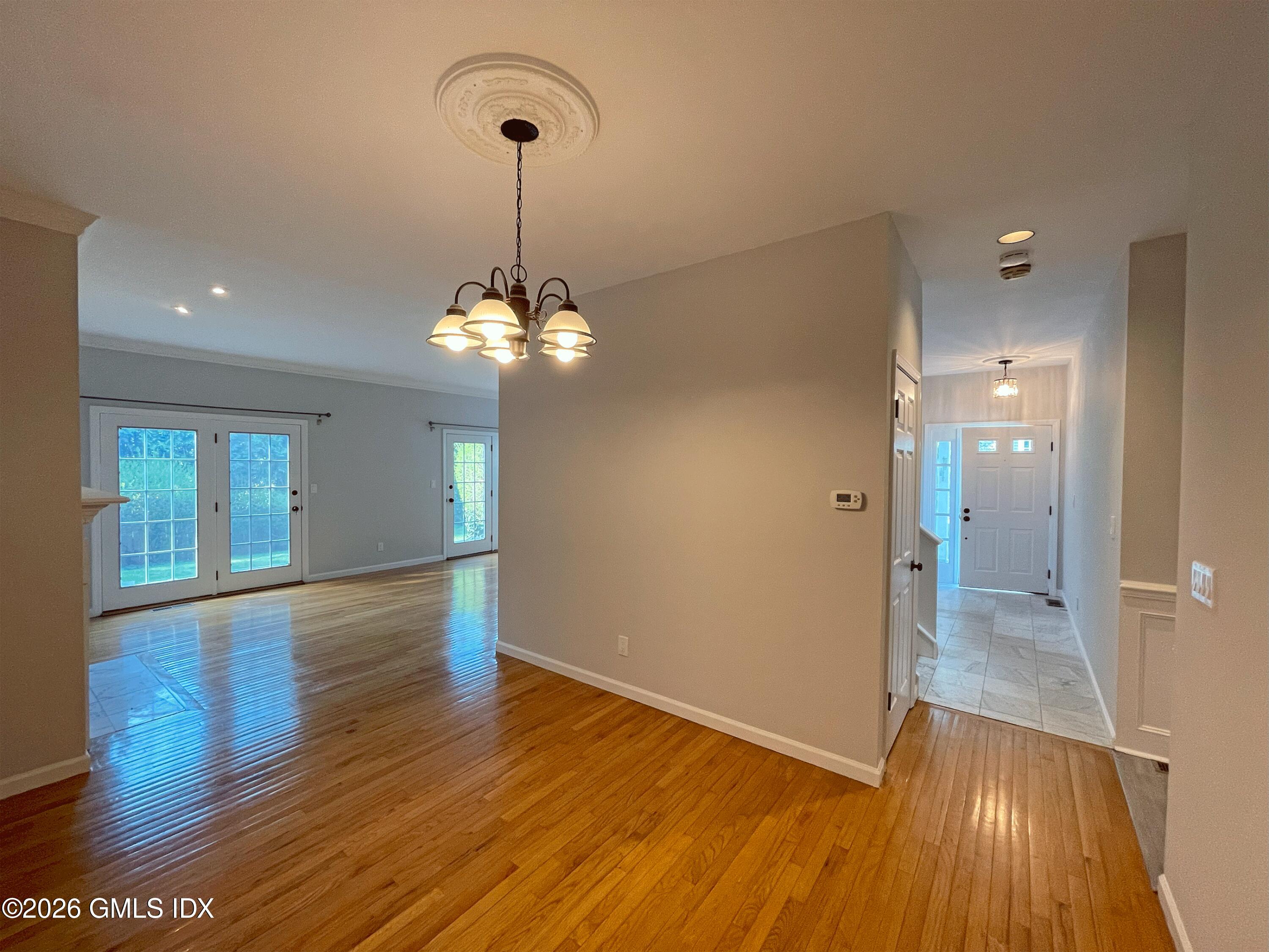 28 Home Place, Unit A2 Greenwich, CT 06830 - Photo 8 of 28 a view of empty room with wooden floor