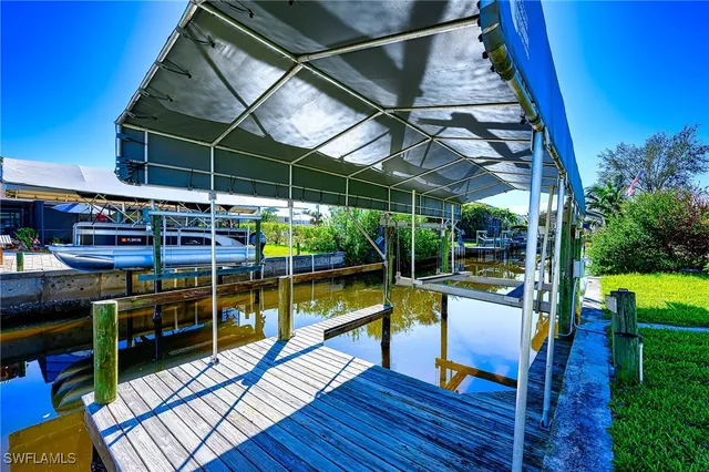a view of an chair and table in patio