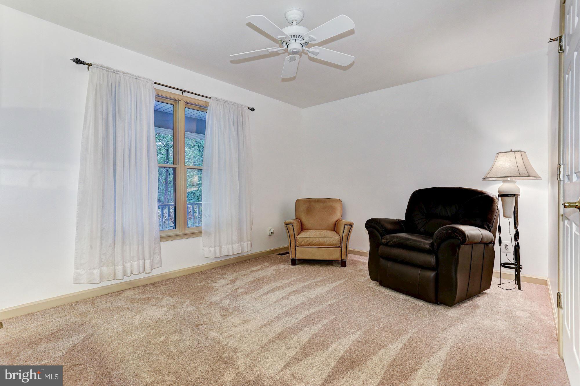 4006 Roop Road New Windsor, MD 21776 - Photo 13 of 22 a living room with furniture