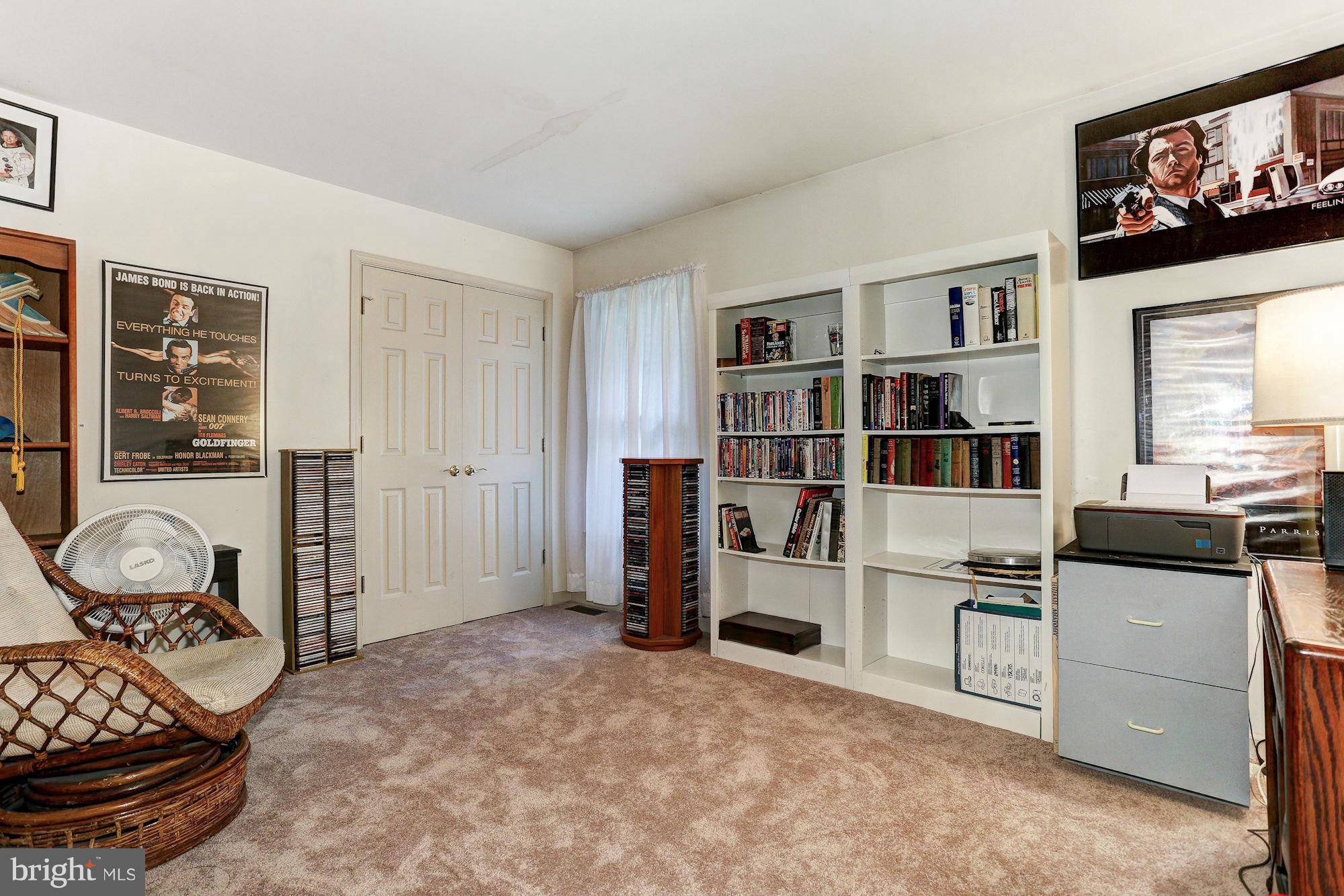 4006 Roop Road New Windsor, MD 21776 - Photo 15 of 22 a view of a livingroom with furniture and toys