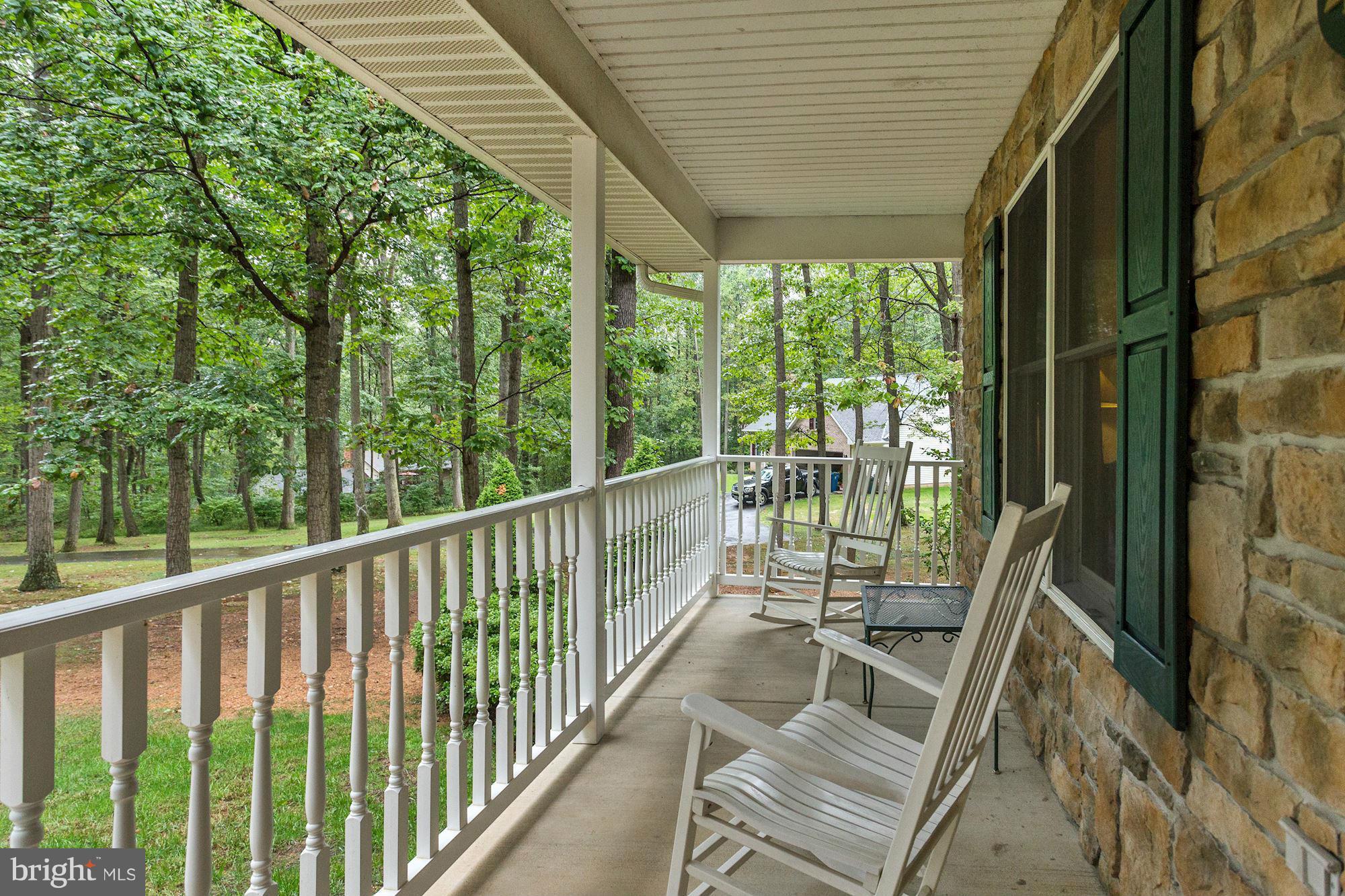 4006 Roop Road New Windsor, MD 21776 - Photo 19 of 22 a view of balcony with wooden floor