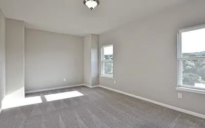 an empty room with windows