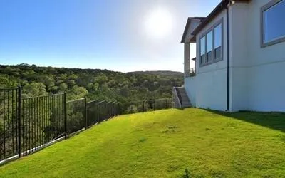 a view of a backyard with mountain view and mountain view