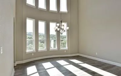 a view of an empty room and window
