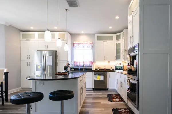 a bedroom with two beds and a window