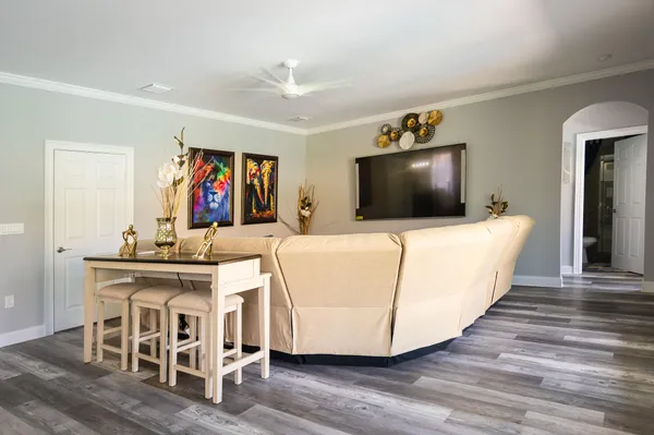 a bedroom with two beds and dresser