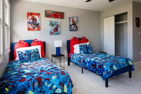 a bathroom with a shower sink and mirror