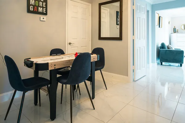 a bedroom with a bed and dresser