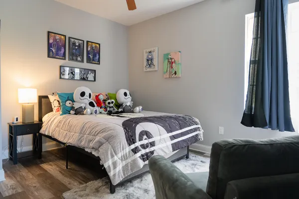 a kitchen with a table chairs stove and cabinets