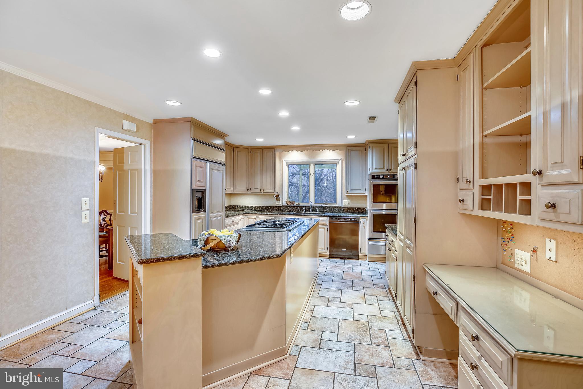 11781 Gainsborough Road Potomac, MD 20854 - Photo 15 of 65 Kitchen with granite countertops and ceramic tile