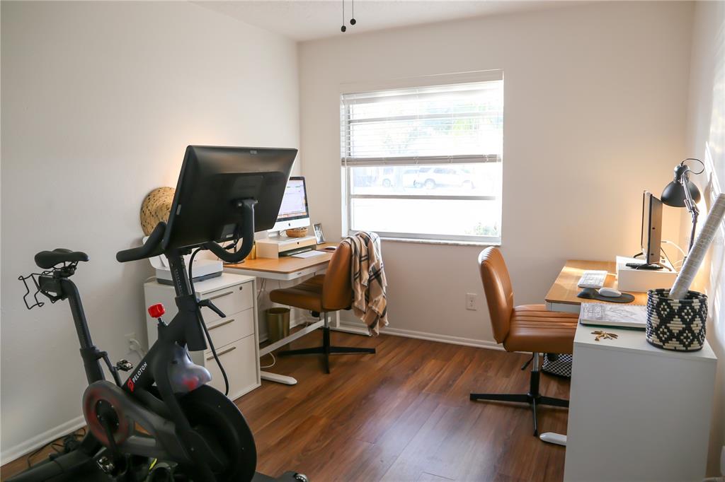 1810 Copper Kettle Lane Dunedin, FL 34698 - Photo 12 of 22 a view of a workspace with furniture and a window