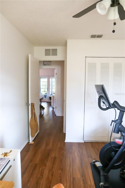 1810 Copper Kettle Lane Dunedin, FL 34698 - Photo 10 of 22 a view of a room with gym equipment