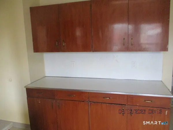 a view of room with cabinets