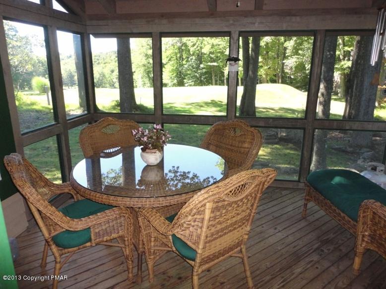 107 Creekside Road Canadensis, PA 18325 - Photo 4 of 31 Screened Porch with Golf and Mountain vi
